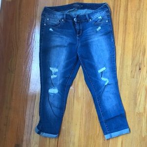 Distressed Torrid cropped jeans.